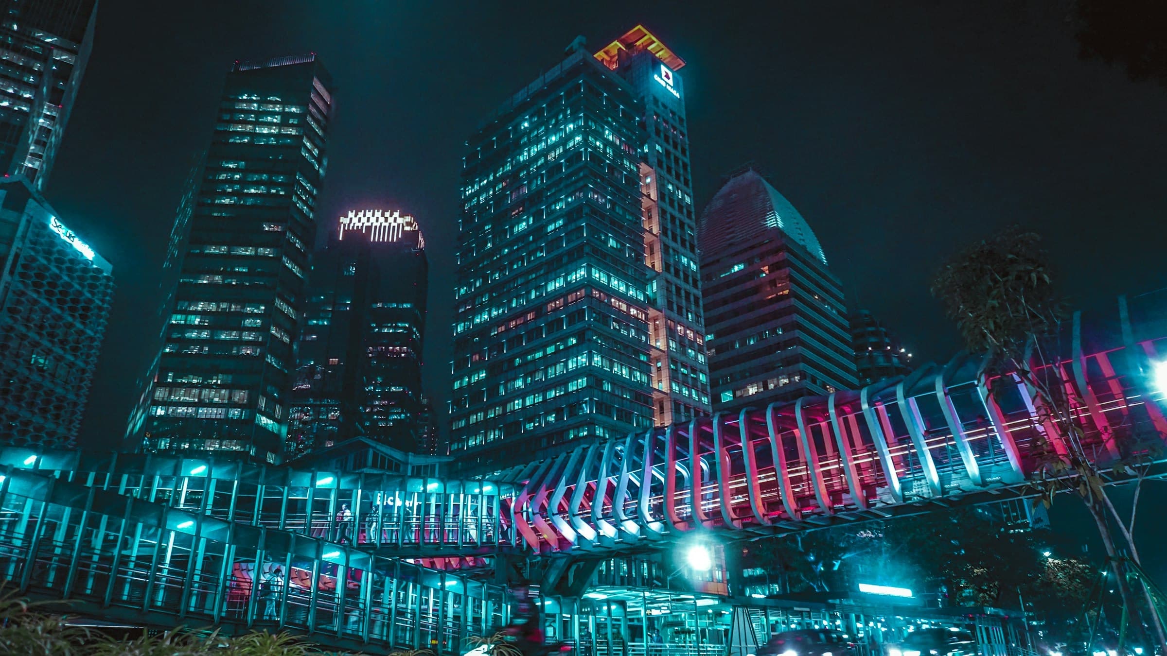 Office towers lit at night in central Jakarta