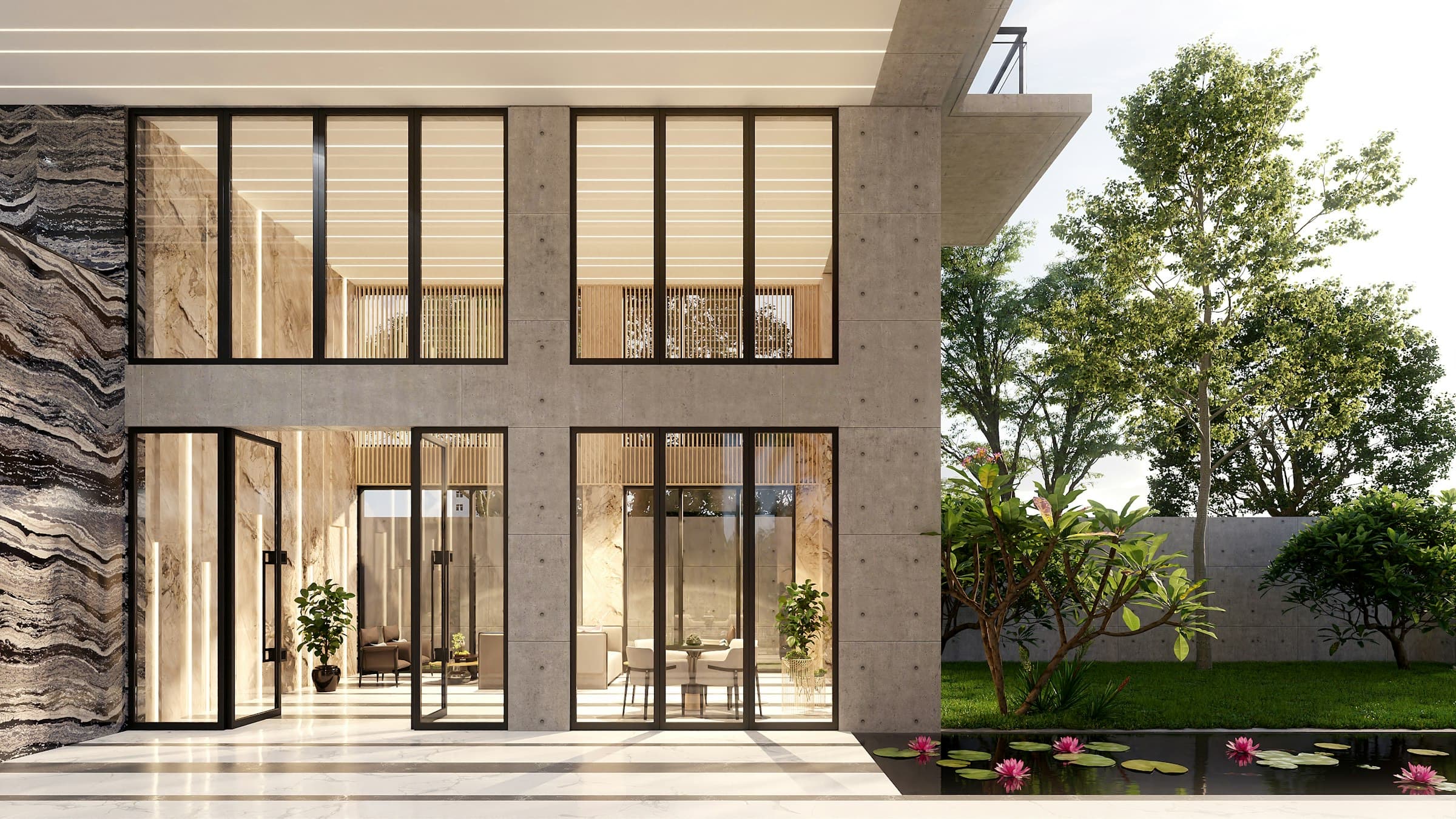 Two-storey house with a natural stone facade, tall glazing and a lily pond